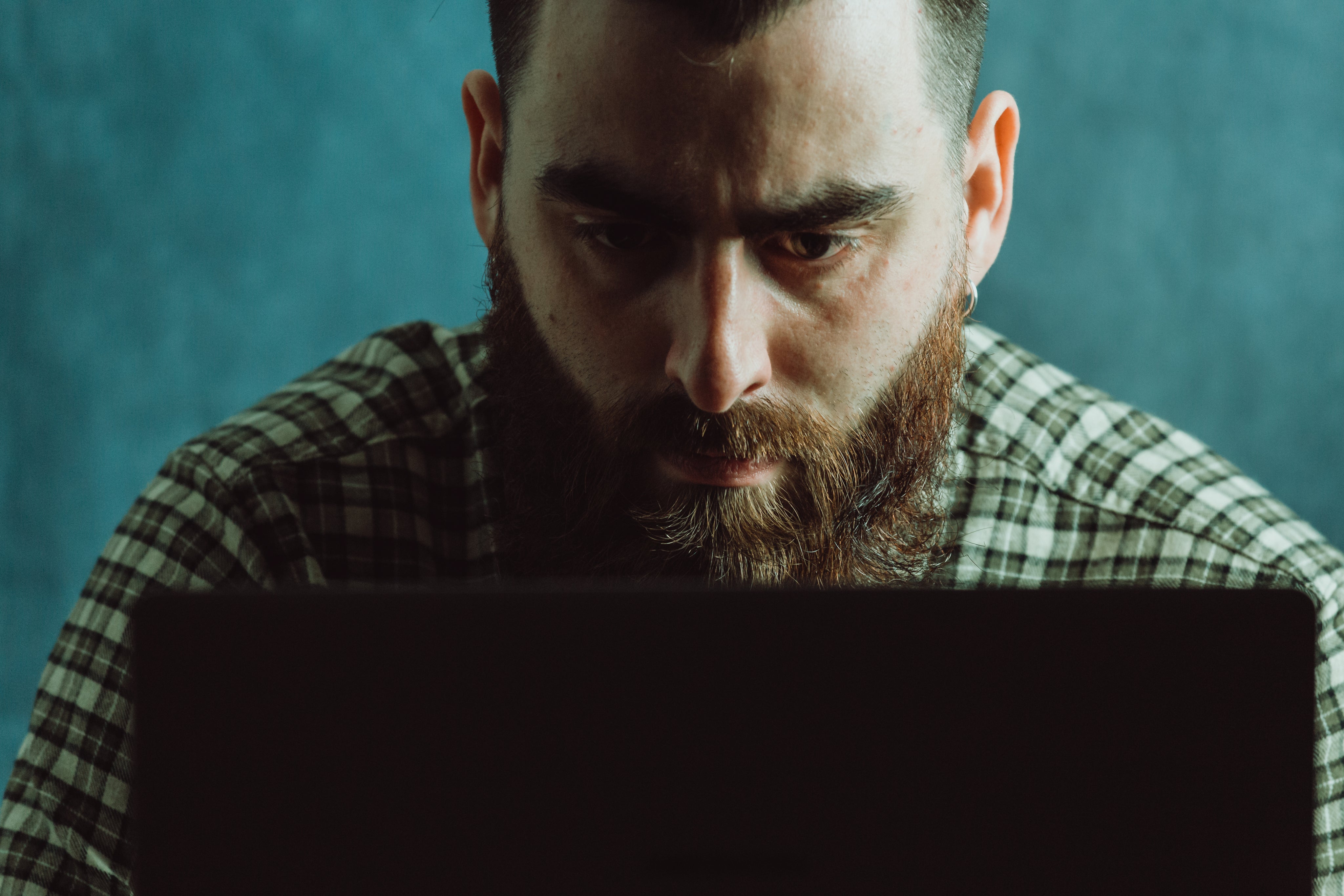 files/man-in-deep-concentration-looks-down-at-a-laptop.jpg